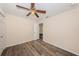 This bedroom features updated flooring and a ceiling fan for added comfort at 8184 49Th N Ave, St Petersburg, FL 33709