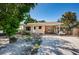 Charming single-story home with a covered carport and well-maintained front yard at 8184 49Th N Ave, St Petersburg, FL 33709