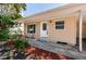 Close-up of a well-maintained single-story home with a covered carport at 8184 49Th N Ave, St Petersburg, FL 33709