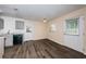 Open-concept living area with access to the kitchen and back patio at 8184 49Th N Ave, St Petersburg, FL 33709