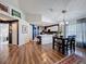 The dining room is adjacent to the modern kitchen and living room area at 7516 S Mascotte St, Tampa, FL 33616