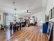 Spacious living area with hardwood floors, ceiling fan, comfortable couch and lots of decor at 7516 S Mascotte St, Tampa, FL 33616