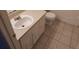 This bathroom features a tile floor, with a white sink and a toilet next to it at 1000 13Th S Ave, St Petersburg, FL 33705