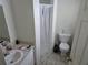 Bathroom featuring a sink, shower, and toilet at 1000 13Th S Ave, St Petersburg, FL 33705
