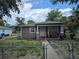 Charming single-story home with a cozy front porch, inviting outdoor gatherings and relaxation at 1000 13Th S Ave, St Petersburg, FL 33705