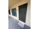 Welcome home to this inviting condo entrance with a secure screen door and plenty of natural light at 1020 85Th N Ave # 223, St Petersburg, FL 33702