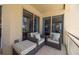 Relax and unwind on this cozy balcony with comfortable seating, perfect for enjoying ocean breezes at 11 Baymont St # 505, Clearwater Beach, FL 33767