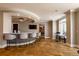 Stylish bar area with countertop seating, decorative lighting, and tile flooring at 11 Baymont St # 505, Clearwater Beach, FL 33767