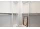 Walk-in closet with storage space and custom shelving at 11 Baymont St # 505, Clearwater Beach, FL 33767