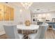 The dining area features a white table and flows into the kitchen, perfect for entertaining guests at 11 Baymont St # 505, Clearwater Beach, FL 33767