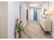 Inviting entryway with wood floors, accent furniture, and contemporary decor at 11 Baymont St # 505, Clearwater Beach, FL 33767