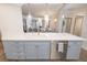 Open kitchen featuring a spacious island with a sink and stainless steel dishwasher at 11 Baymont St # 505, Clearwater Beach, FL 33767