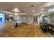 Elegant lobby with marble floors, chandelier, marble table with flowers, and comfortable seating at 11 Baymont St # 505, Clearwater Beach, FL 33767