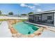 Gorgeous pool and patio area with outdoor seating, ideal for summer fun at 1304 Cedar Ct, Tarpon Springs, FL 34689