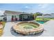 Inviting backyard with a pool, hot tub, and patio, perfect for outdoor living at 1304 Cedar Ct, Tarpon Springs, FL 34689