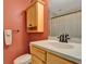 Ensuite bathroom featuring a single sink and mirror at 13186 Linden Place Dr, Seminole, FL 33776