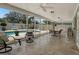 Sunroom with tile floors, furniture and a view of the pool and outdoor area at 13186 Linden Place Dr, Seminole, FL 33776