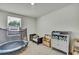 A bedroom featuring neutral walls, carpeted floors, a bed, a trampoline and toys at 13648 Whiskey Daisy Dr, Dade City, FL 33525