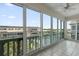 Enjoy stunning views from the tiled balcony with sliding glass doors that bring the outside in at 139 Bluff View Dr # 405, Belleair Bluffs, FL 33770