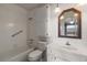 Well-maintained bathroom with a tub, vanity, and ample storage at 139 Bluff View Dr # 405, Belleair Bluffs, FL 33770