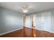 Comfortable bedroom with hard wood floors and an ensuite bathroom at 139 Bluff View Dr # 405, Belleair Bluffs, FL 33770