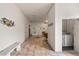 Hallway with elevator access and laundry room at 139 Bluff View Dr # 405, Belleair Bluffs, FL 33770