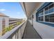 Hallway with windows offering plenty of natural light at 139 Bluff View Dr # 405, Belleair Bluffs, FL 33770