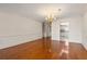 Open living space flows from the dining room into a bright kitchen and living area at 139 Bluff View Dr # 405, Belleair Bluffs, FL 33770