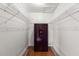 Storage room with built in wire shelving around a Liberty Safe at 139 Bluff View Dr # 405, Belleair Bluffs, FL 33770