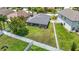 Expansive fenced backyard featuring lush green grass and a well-maintained lawn, perfect for outdoor activities at 14371 Edinburgh Moor Dr, Wimauma, FL 33598