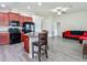 Spacious open floor plan showcasing kitchen, dining, and living areas at 14371 Edinburgh Moor Dr, Wimauma, FL 33598