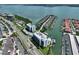 Stunning aerial view of a waterfront condo and marina with boat docks on the inter-coastal waterway at 1591 Gulf Blvd # 304S, Clearwater Beach, FL 33767