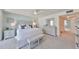 Rest in this beautiful bedroom, complete with a serene color palette and carpeted floor at 1591 Gulf Blvd # 304S, Clearwater Beach, FL 33767