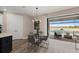 Cozy dining area next to the kitchen with an outdoor view to the pool at 16427 Sapphire Point Dr, Lakewood Ranch, FL 34211