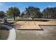 Community playground featuring swings and a play structure for enjoyment at 17509 Queensland St, Land O Lakes, FL 34638