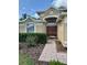 Attractive home facade with covered entryway at 19743 Ellendale Dr, Land O Lakes, FL 34638
