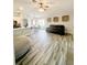 Bright living room featuring hardwood floors and modern furnishings for comfortable everyday living at 19743 Ellendale Dr, Land O Lakes, FL 34638
