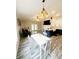 Open-concept living and dining area showcasing a modern kitchen and comfortable living space at 19743 Ellendale Dr, Land O Lakes, FL 34638