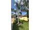 Side yard with a palm tree at 19743 Ellendale Dr, Land O Lakes, FL 34638