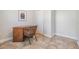 Simple and functional bedroom with tile floors, perfect for a home office or guest room at 201 W Alva St, Tampa, FL 33603