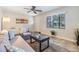 Bright living room with natural light, comfortable seating, and views of the neighborhood at 201 W Alva St, Tampa, FL 33603