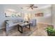 Open-concept living room with a view into the kitchen, perfect for modern living at 201 W Alva St, Tampa, FL 33603