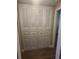 Spacious hall closet with louvered doors and updated floors at 209 Corkwood Ln Ln, Oldsmar, FL 34677