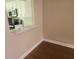 A view from the living room looking into the updated kitchen with a bar countertop at 209 Corkwood Ln Ln, Oldsmar, FL 34677