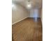 Relaxing living room with ceiling fan and sliding doors that lead to a balcony at 209 Corkwood Ln Ln, Oldsmar, FL 34677