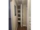 Storage closet featuring shelving for optimal organization and accessibility at 209 Corkwood Ln Ln, Oldsmar, FL 34677