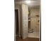 A utility closet provides extra storage with white doors and tile floor at 209 Corkwood Ln Ln, Oldsmar, FL 34677