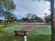 Outdoor basketball court and tennis courts available for resident use with lush green landscape at 209 Corkwood Ln, Oldsmar, FL 34677