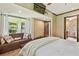 Bedroom with a built-in window seat and a view to the outside at 2103 N Golfview Dr, Plant City, FL 33566