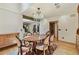 Formal dining room featuring a chandelier, an oval table, and seating for six at 2103 N Golfview Dr, Plant City, FL 33566